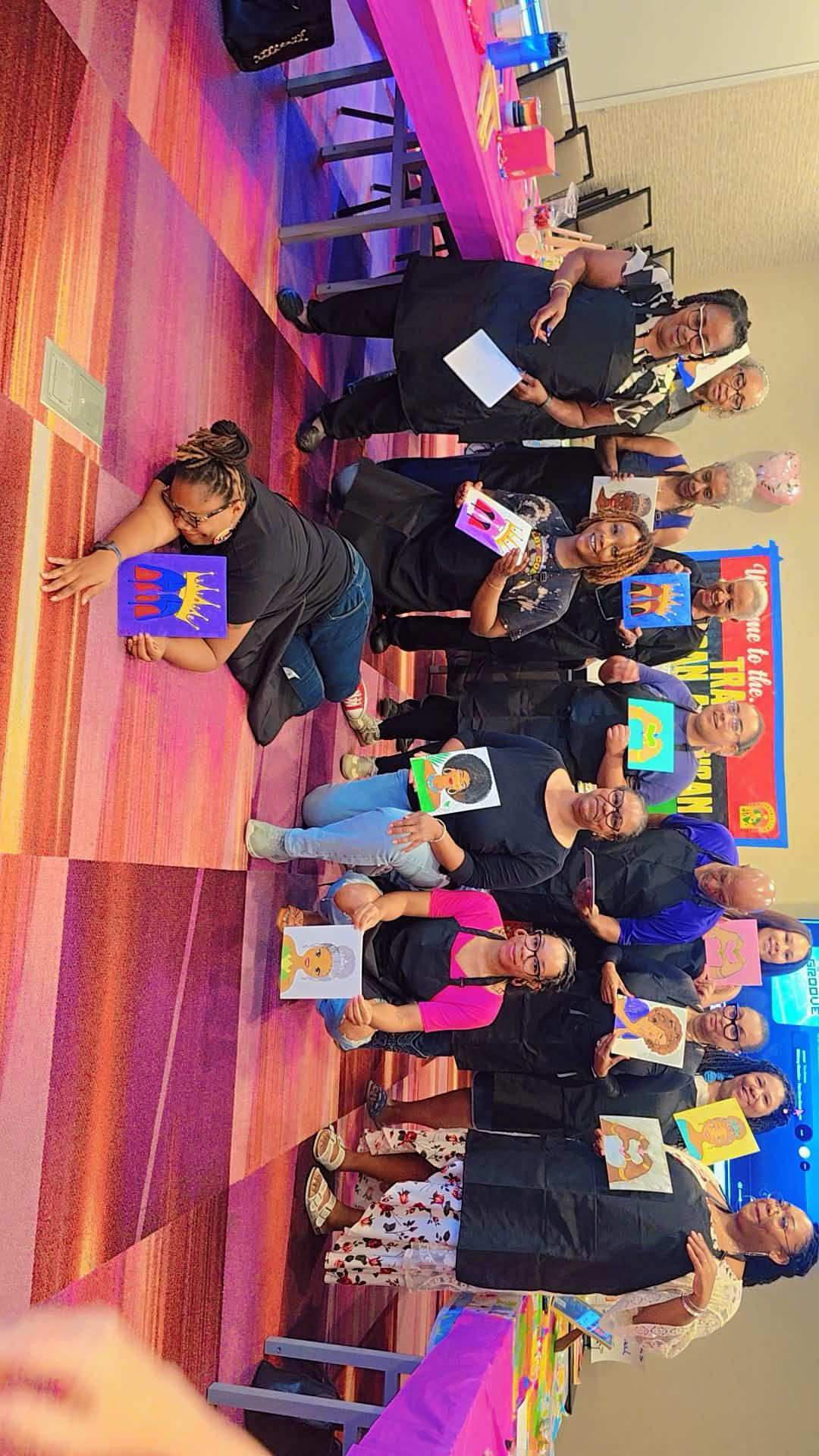 Paint and Create group holding finished artwork